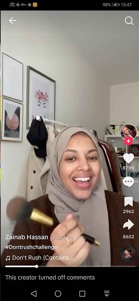 TikTok Don't Rush Challenge - Zainab is sitting without any make up on and is cheerfully getting ready for the transition